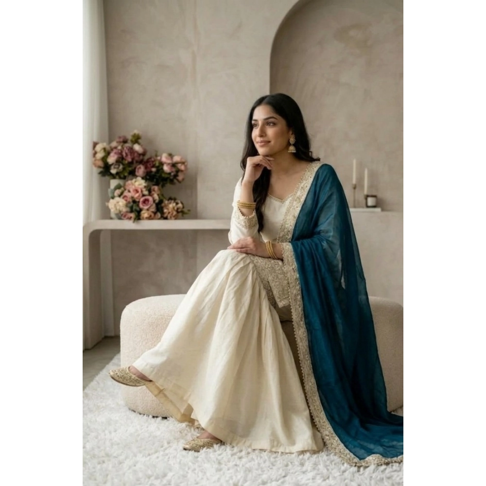 generic women's silk embroidered 3/4th sleeve v neck kurti with sharara pant and dupatta set (cream & teal) generic women's silk embroidered 3/4th sleeve v neck kurti with sharara pant and dupatta set (cream & teal)