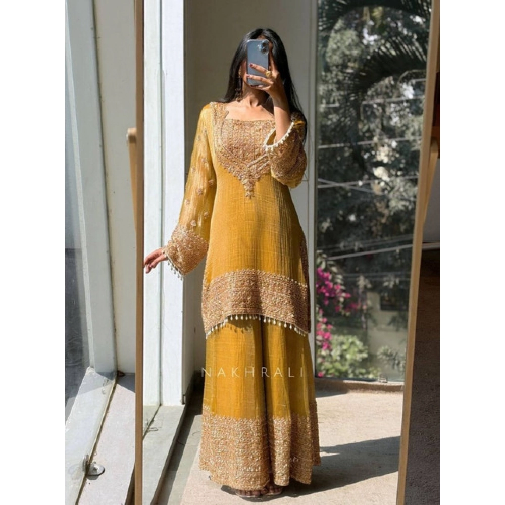 generic women's silk embroidered 3/4th sleeve round kurti with sharara pant and dupatta set (yellow) generic women's silk embroidered 3/4th sleeve round kurti with sharara pant and dupatta set (yellow)