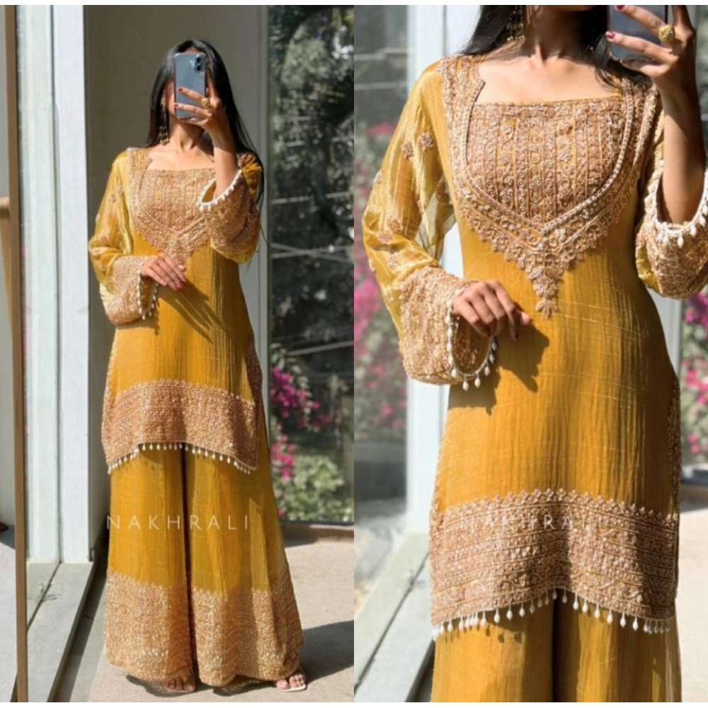 generic women's silk embroidered 3/4th sleeve round kurti with sharara pant and dupatta set (yellow) generic women's silk embroidered 3/4th sleeve round kurti with sharara pant and dupatta set (yellow)